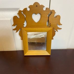Small handmade mirror but local Delaware artists.